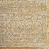 Handmade rug with beige and gold geometric pattern, rectangular border