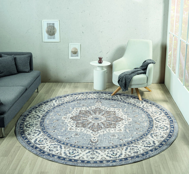 United Weavers Armada Enterprise Blue Rug - round room scene