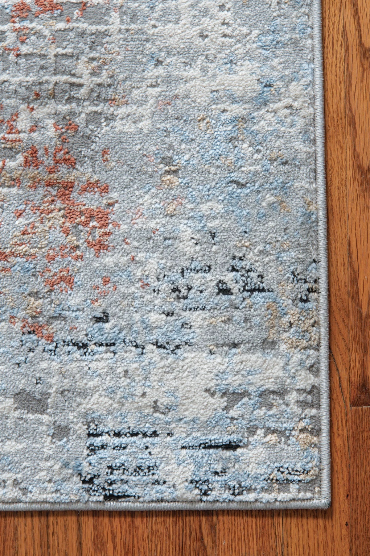 United Weavers Austin Devine Rust Rug - angle view