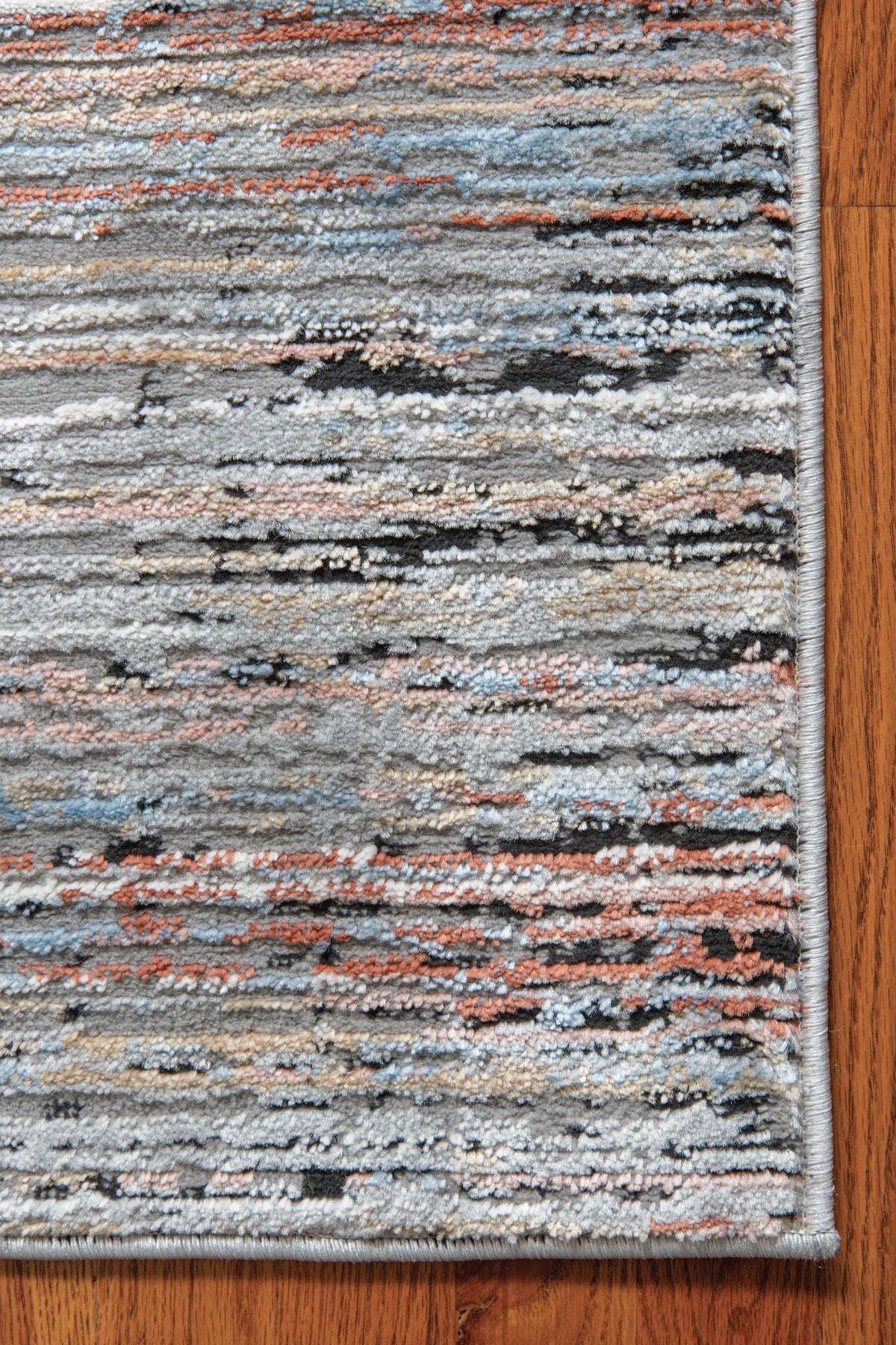 United Weavers Austin Westway Rust Rug - angle view