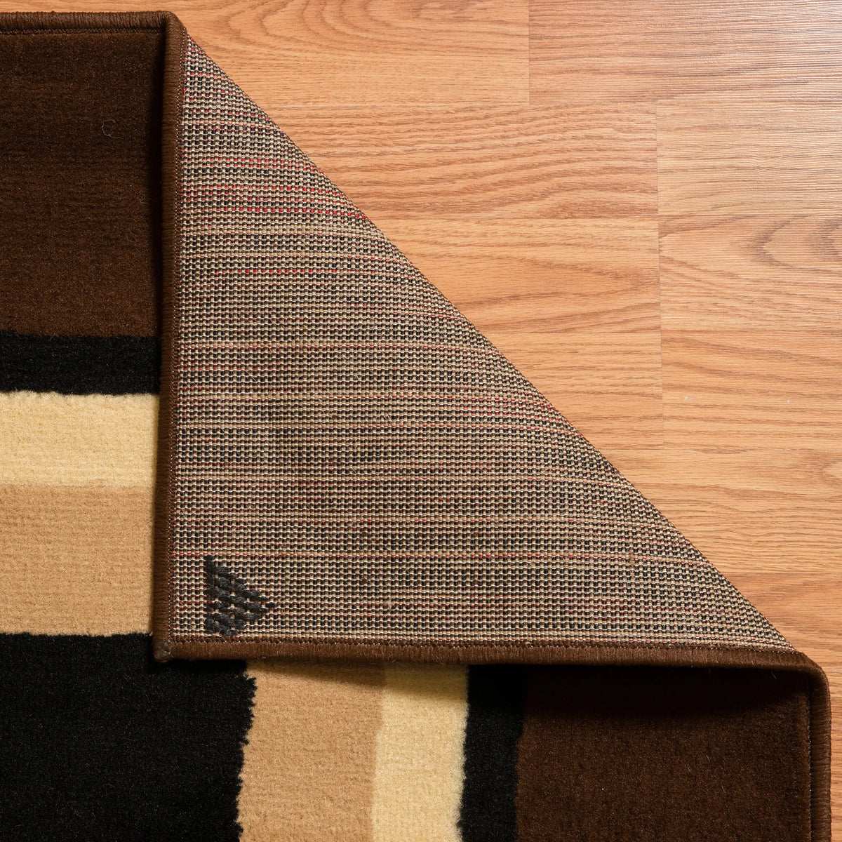 United Weavers Dallas Spaces Brown Rug - backing detail