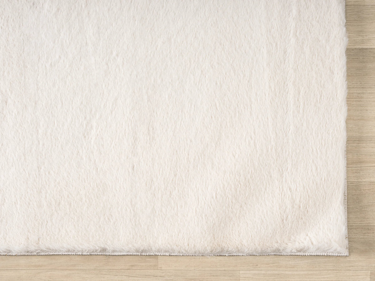United Weavers Lavish Solid United Weavers Lavish Solid Plush Beige Rug - angle view