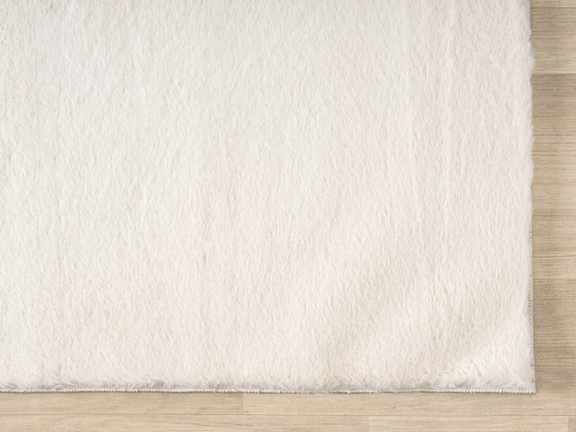 United Weavers Lavish Solid United Weavers Lavish Solid Plush Beige Rug - angle view