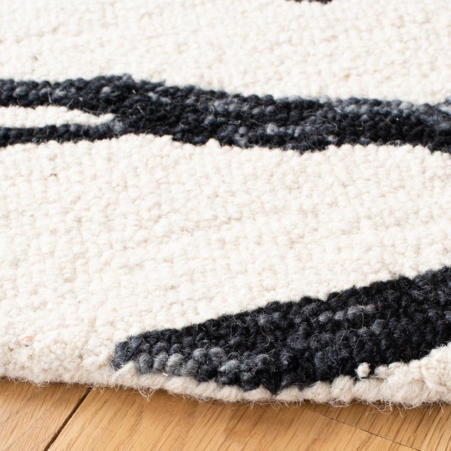 Safavieh Metro Met403Z Black/Ivory Rugs.