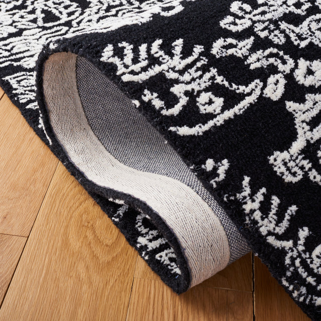 Safavieh Metro Met993Z Black/Ivory Rugs.