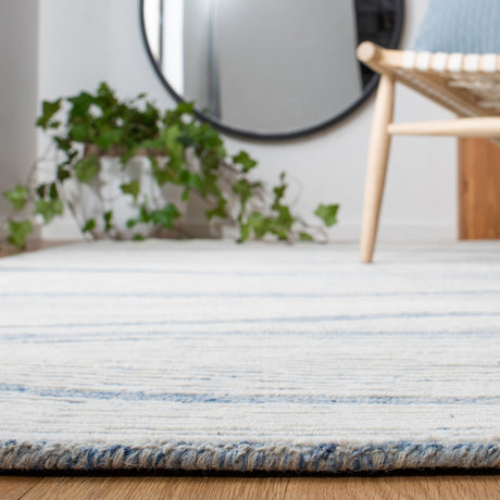 Safavieh Metro Met995M Blue/Ivory Rug.
