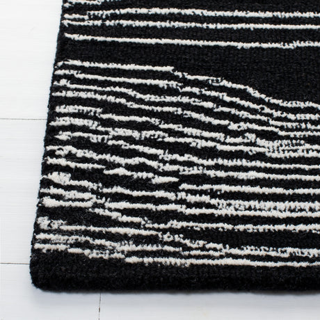 Safavieh Metro Met995Z Black/Ivory Rugs.