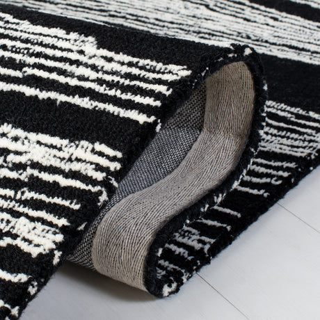 Safavieh Metro Met995Z Black/Ivory Rugs.