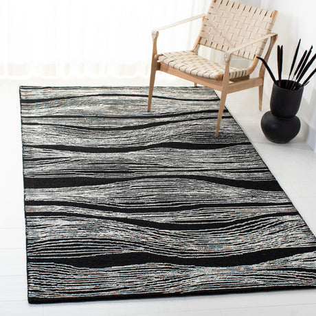 Safavieh Metro Met995Z Black/Ivory Rugs.