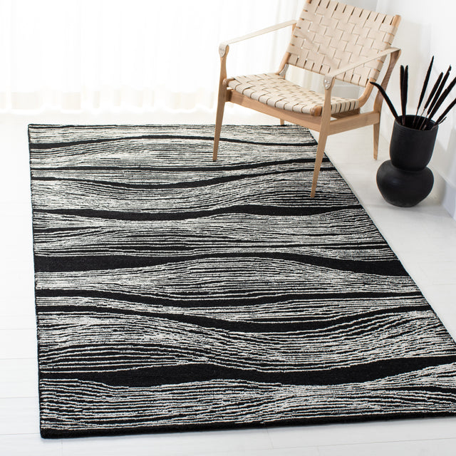 Safavieh Metro Met995Z Black/Ivory Rugs.