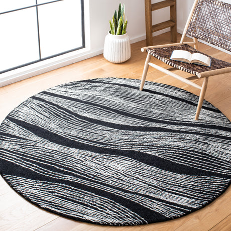 Safavieh Metro Met995Z Black/Ivory Rugs.