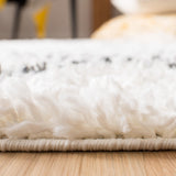 Safavieh Moroccan Tassel Shag Mts335A Ivory/Dark Grey Rug.