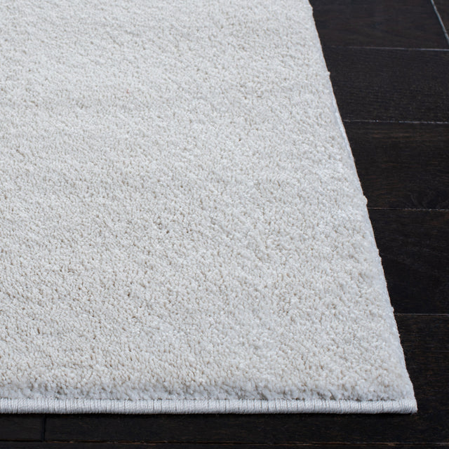 Safavieh Plain And Solid Pns320 Ivory Rug.
