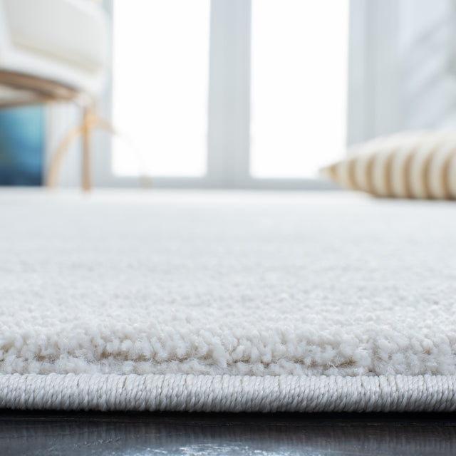 Safavieh Plain And Solid Pns320 Ivory Rug.