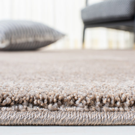 Safavieh Plain And Solid Pns320 Taupe Rug.