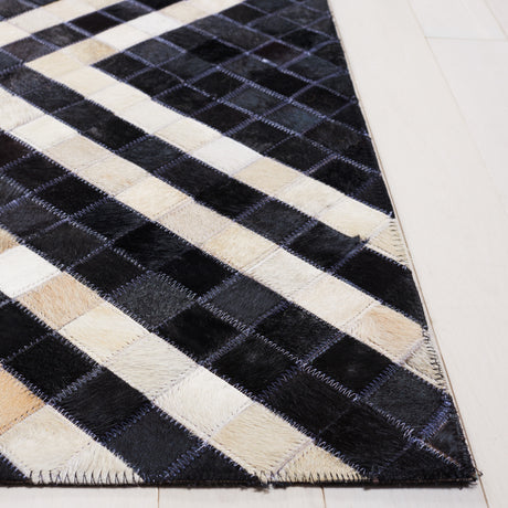 Safavieh Studio Leather Stl233Z Black/Ivory Rug.