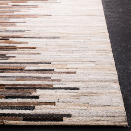 Safavieh Studio Leather Stl814A Ivory/Brown Rugs.