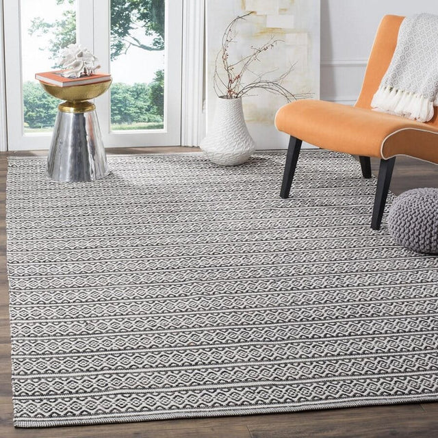 Safavieh Montauk Mtk341D Ivory / Black Rugs.