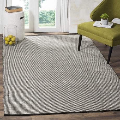 Safavieh Montauk Mtk345D Ivory / Black Rugs.