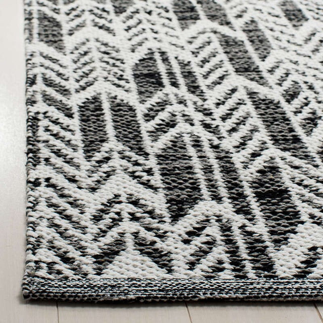 Safavieh Montauk Mtk609A Black / Ivory Rugs.