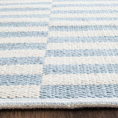 Safavieh Montauk Mtk715B Ivory / Light Blue Rugs.