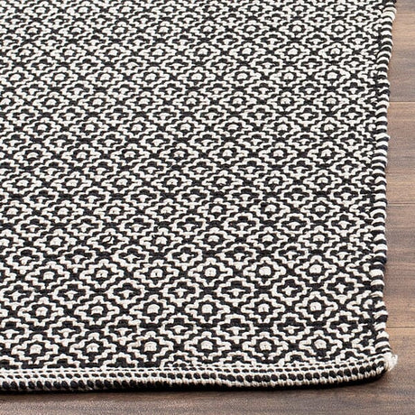 Safavieh Montauk Mtk717D Ivory / Black Rugs.