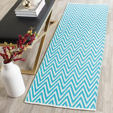 Safavieh Montauk Mtk812H Turquoise / Ivory Rugs.