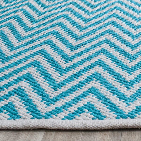 Safavieh Montauk Mtk812H Turquoise / Ivory Rugs.