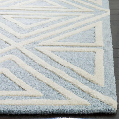 Safavieh Safavieh Kids Sfk912E Blue / Ivory Geometric Area Rug