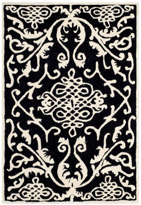 Safavieh Soho Soh120A Black / Ivory Rugs.