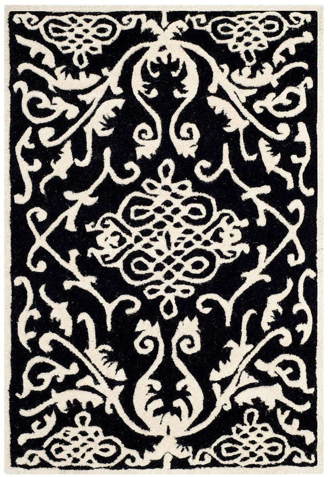 Safavieh Soho Soh120A Black / Ivory Rugs.