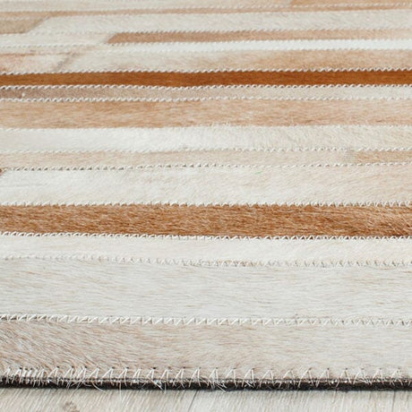 Safavieh Studio Leather Stl218B Tan / Ivory Rugs.