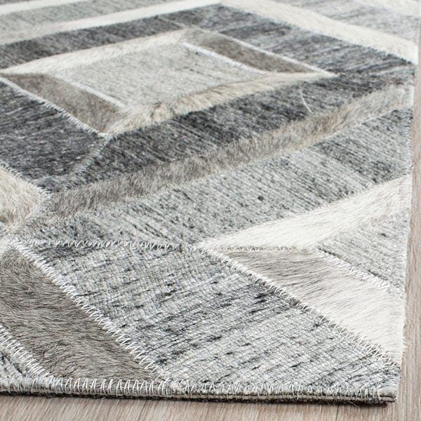 Safavieh Studio Leather Stl221A Ivory / Dark Grey Rugs.