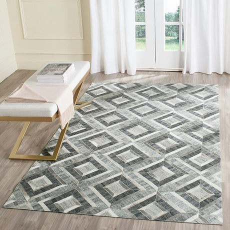 Safavieh Studio Leather Stl221A Ivory / Dark Grey Rugs.