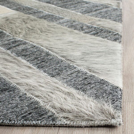 Safavieh Studio Leather Stl223A Ivory / Dark Grey Rugs.