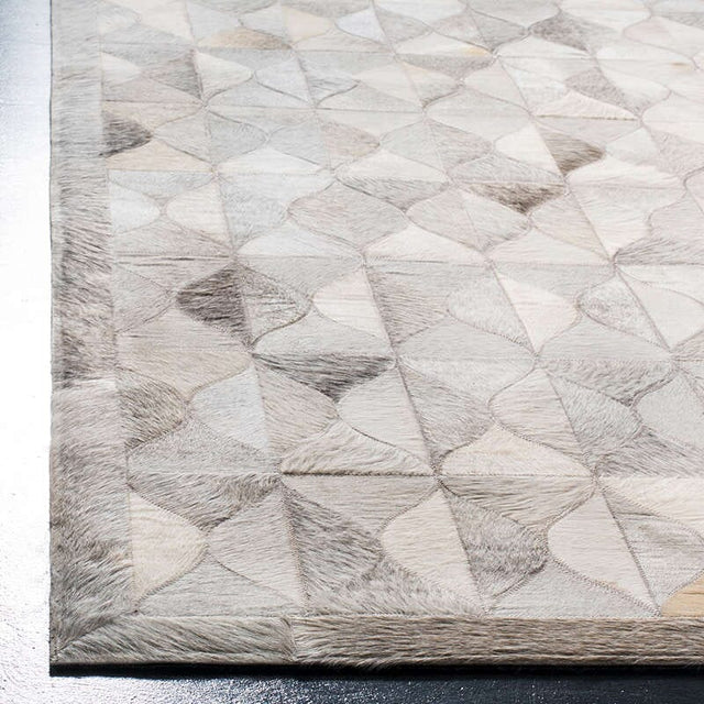 Safavieh Studio Leather Stl224F Grey / Ivory Rugs.