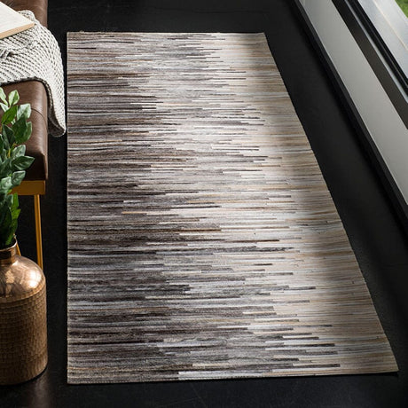 Safavieh Studio Leather Stl225H Charcoal / Ivory Rugs.