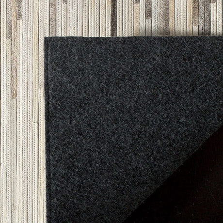 Safavieh Studio Leather Stl225H Charcoal / Ivory Rugs.