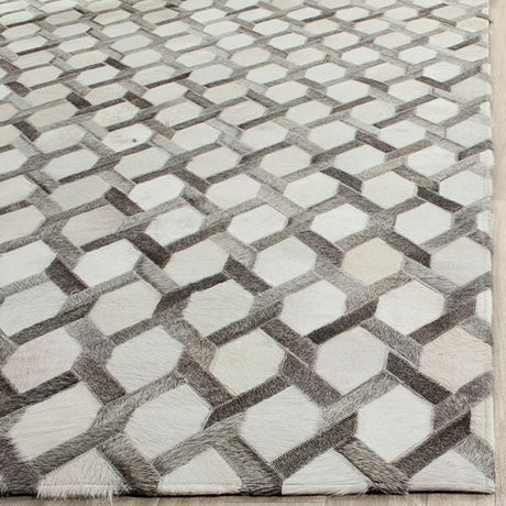 Safavieh Studio Leather Stl666A Ivory / Grey Rugs.